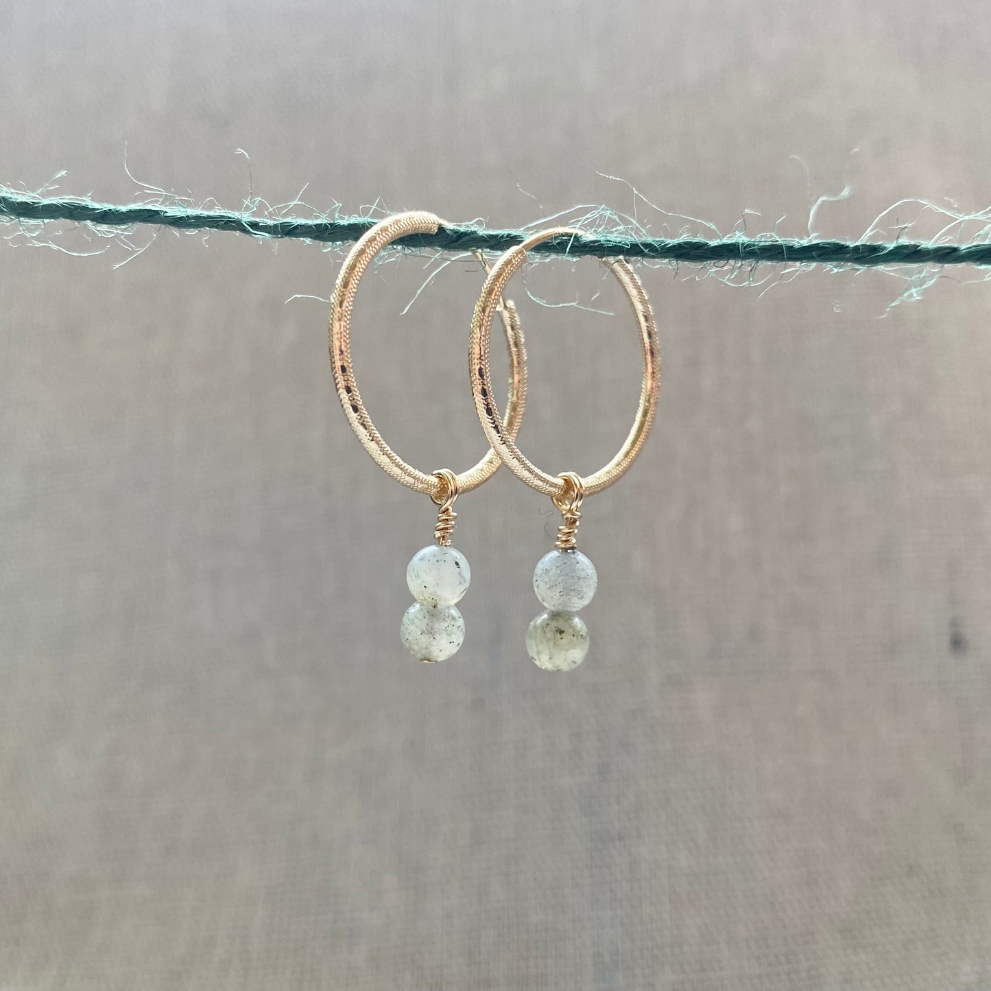 Precious Charms on Gold Patterned Hoops