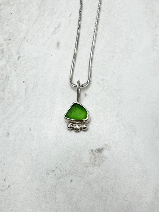 Green Sunburst Pendant Silver
