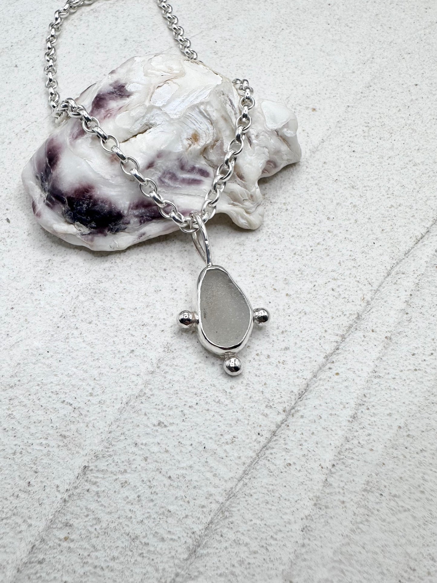 White Sunburst Pendant Silver