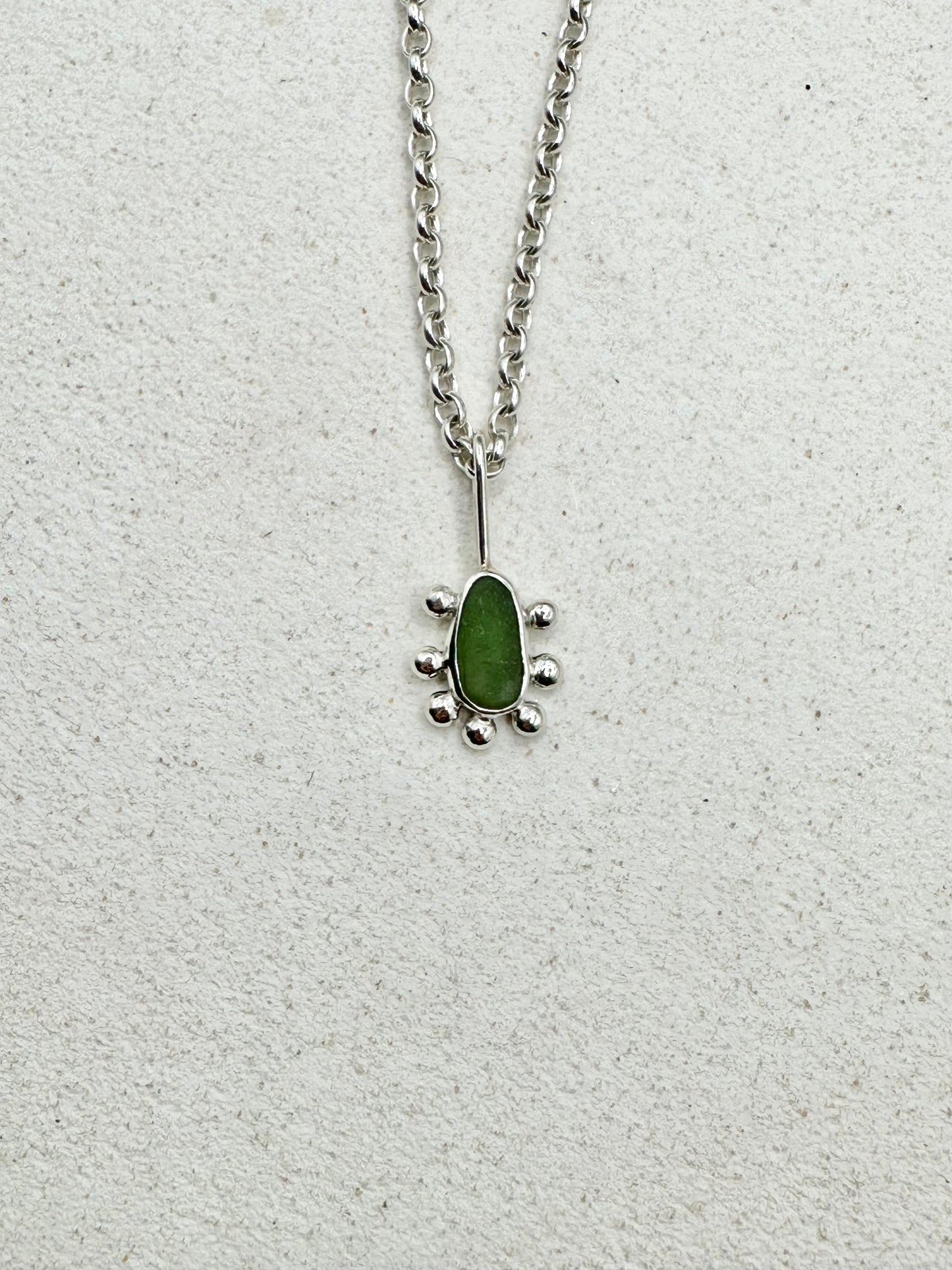 Green Sunburst Pendant Silver