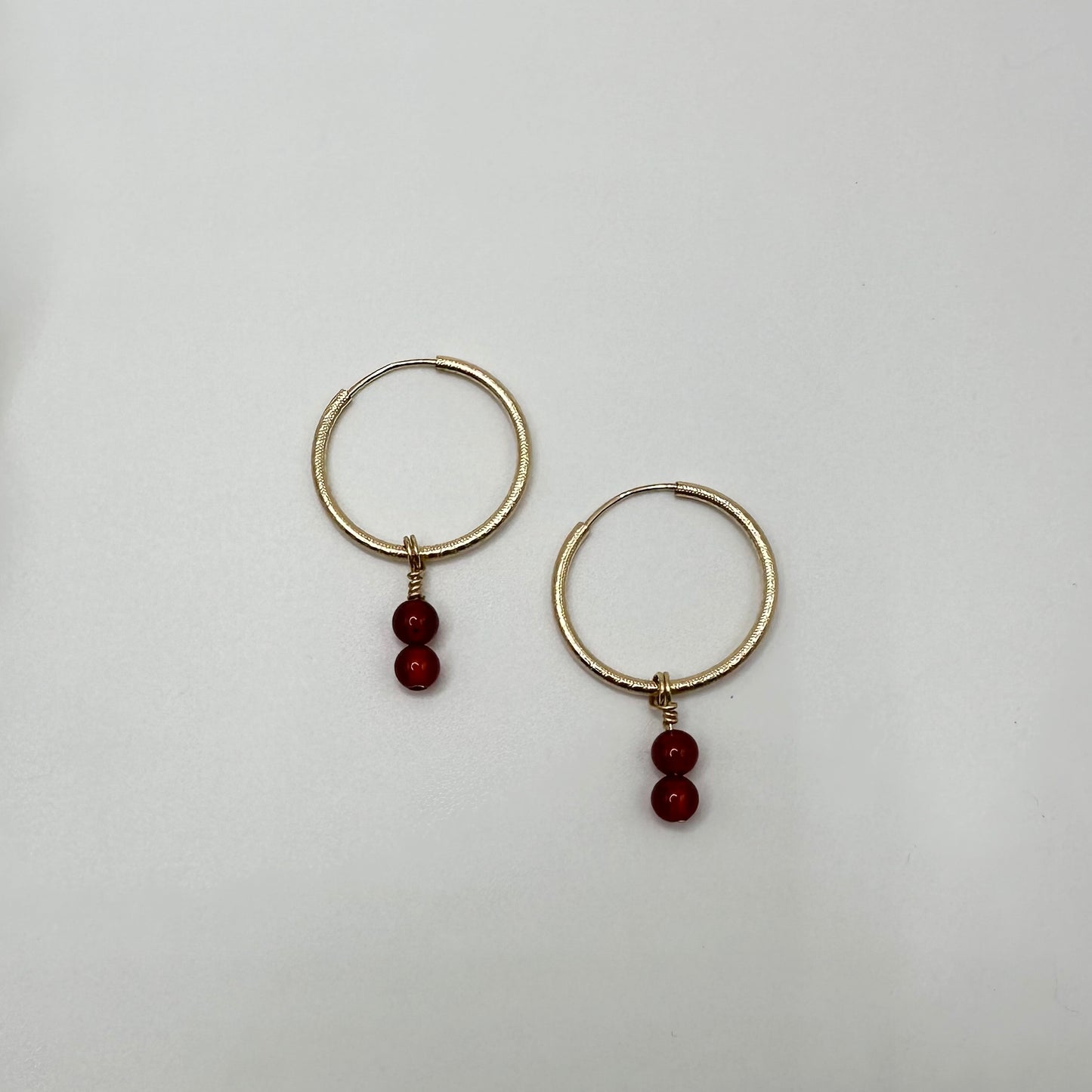 Precious Charms on Gold Patterned Hoops