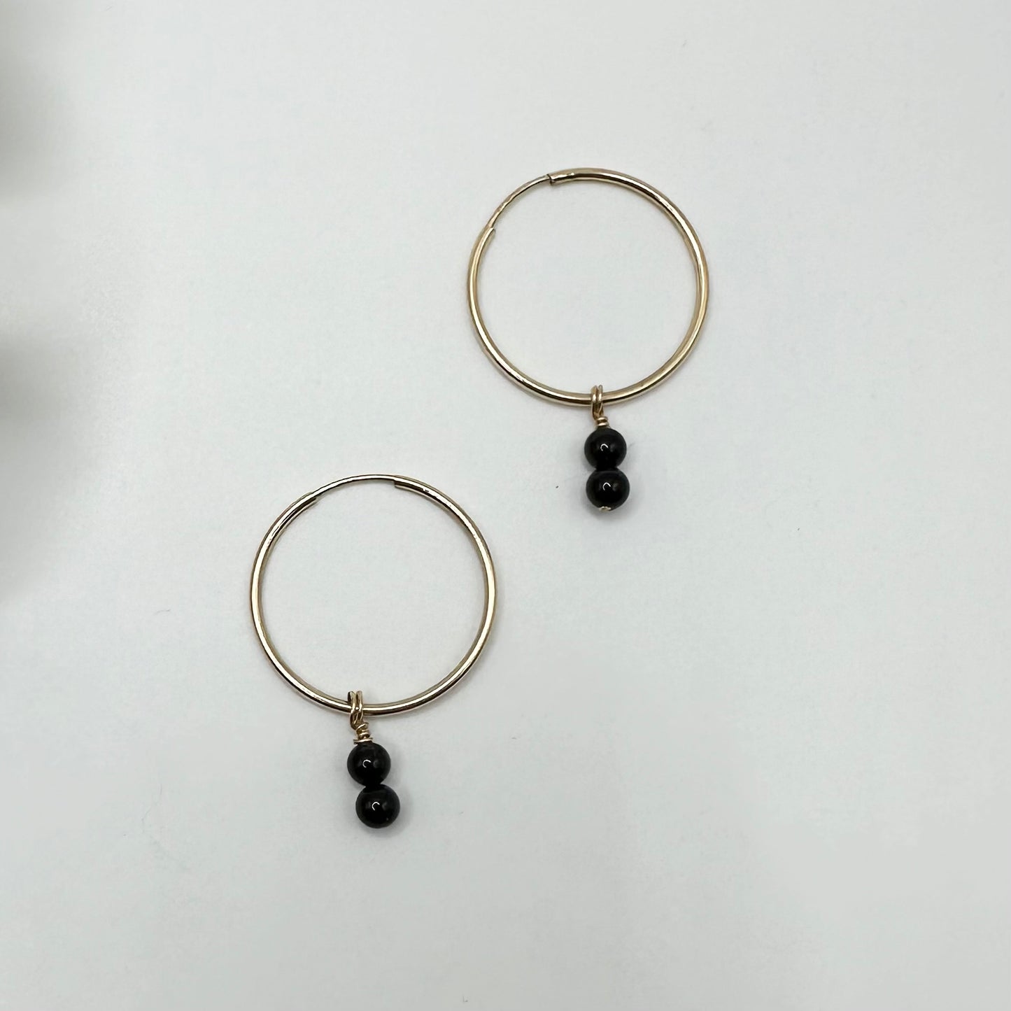 Precious Charms on Gold Hoops