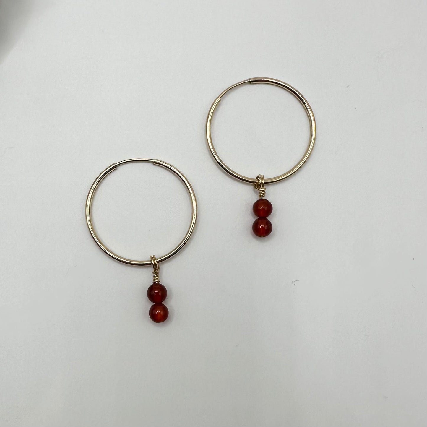 Precious Charms on Gold Hoops