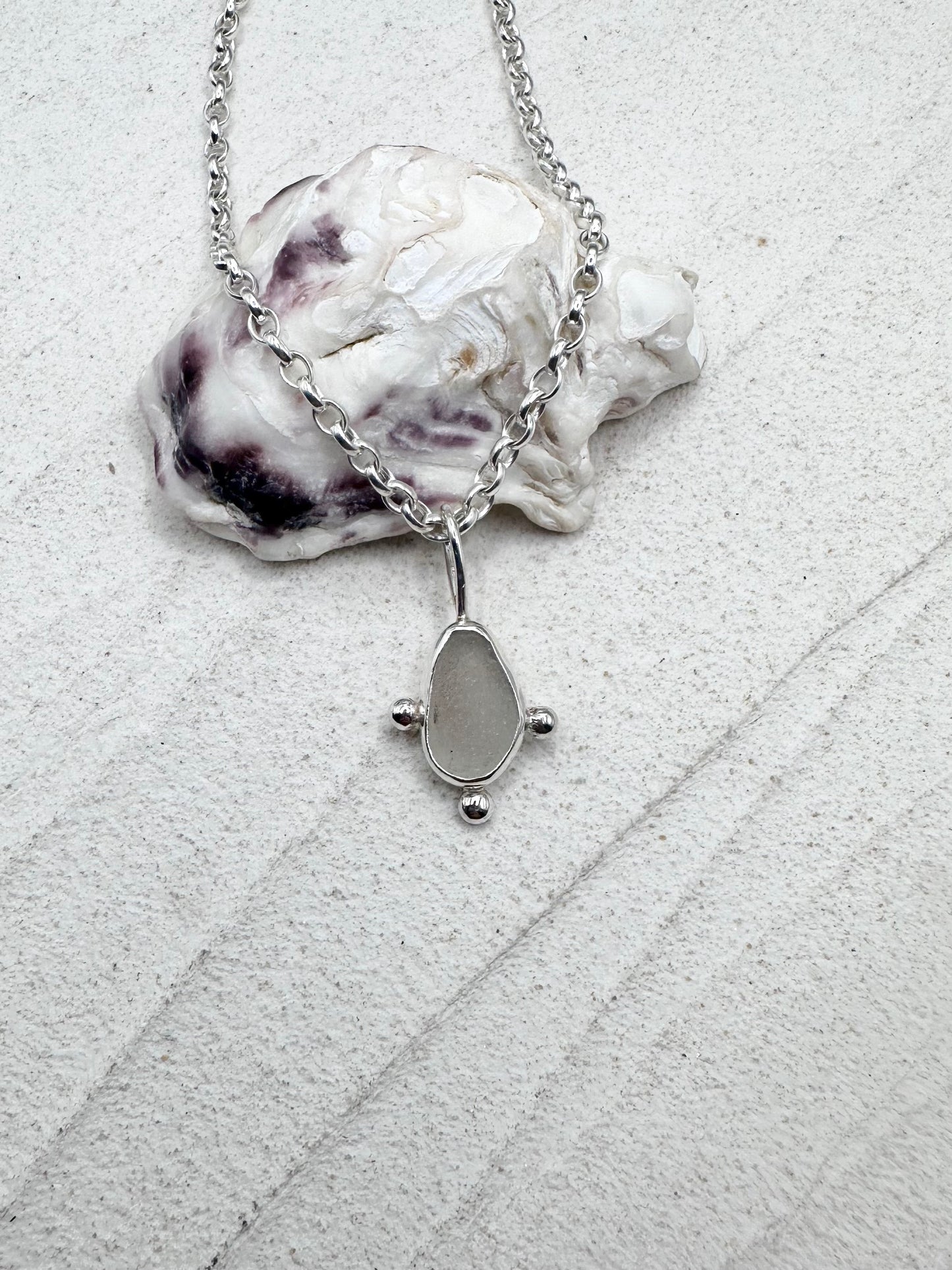 White Sunburst Pendant Silver