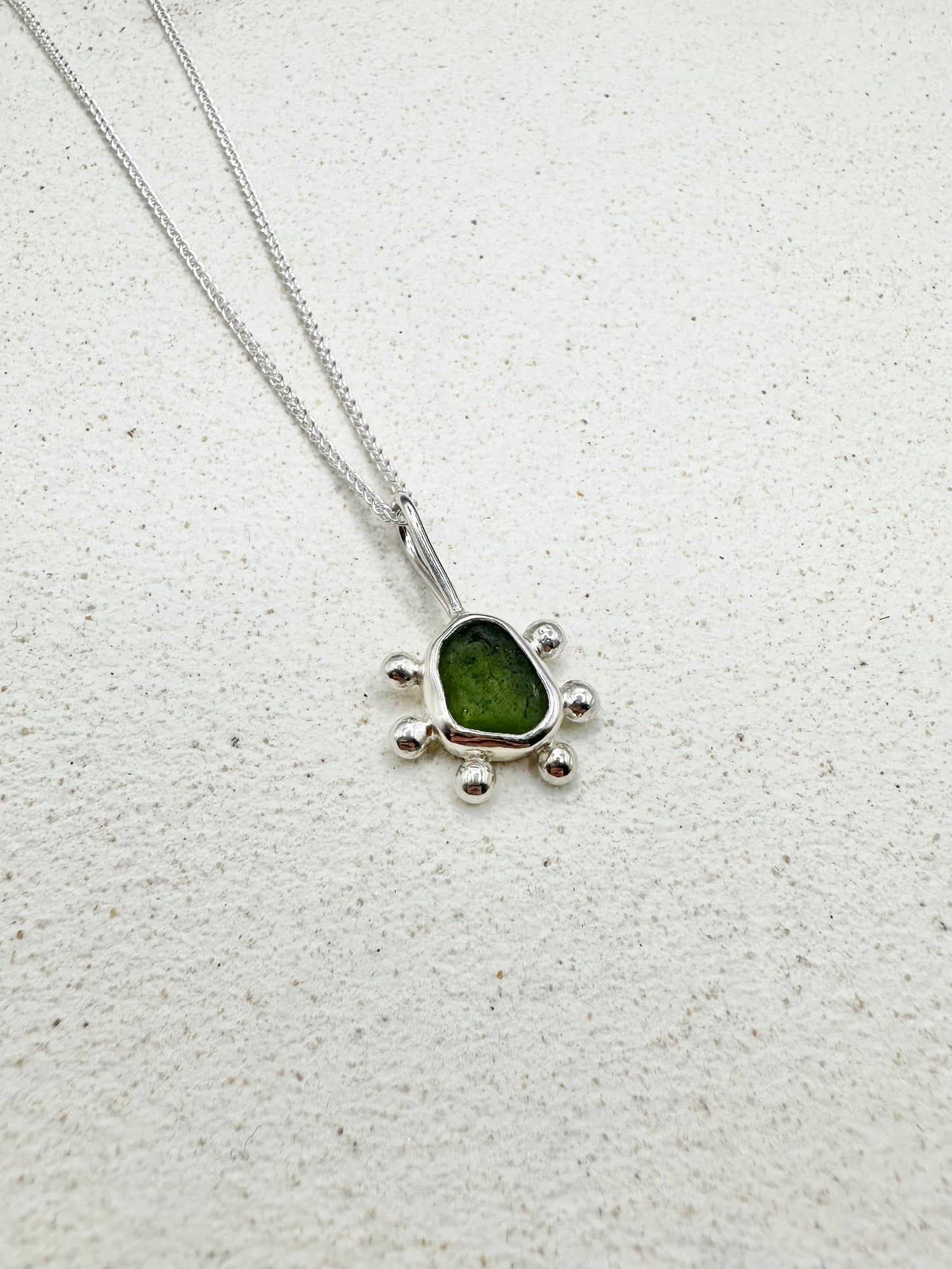 Green Sunburst Pendant Silver