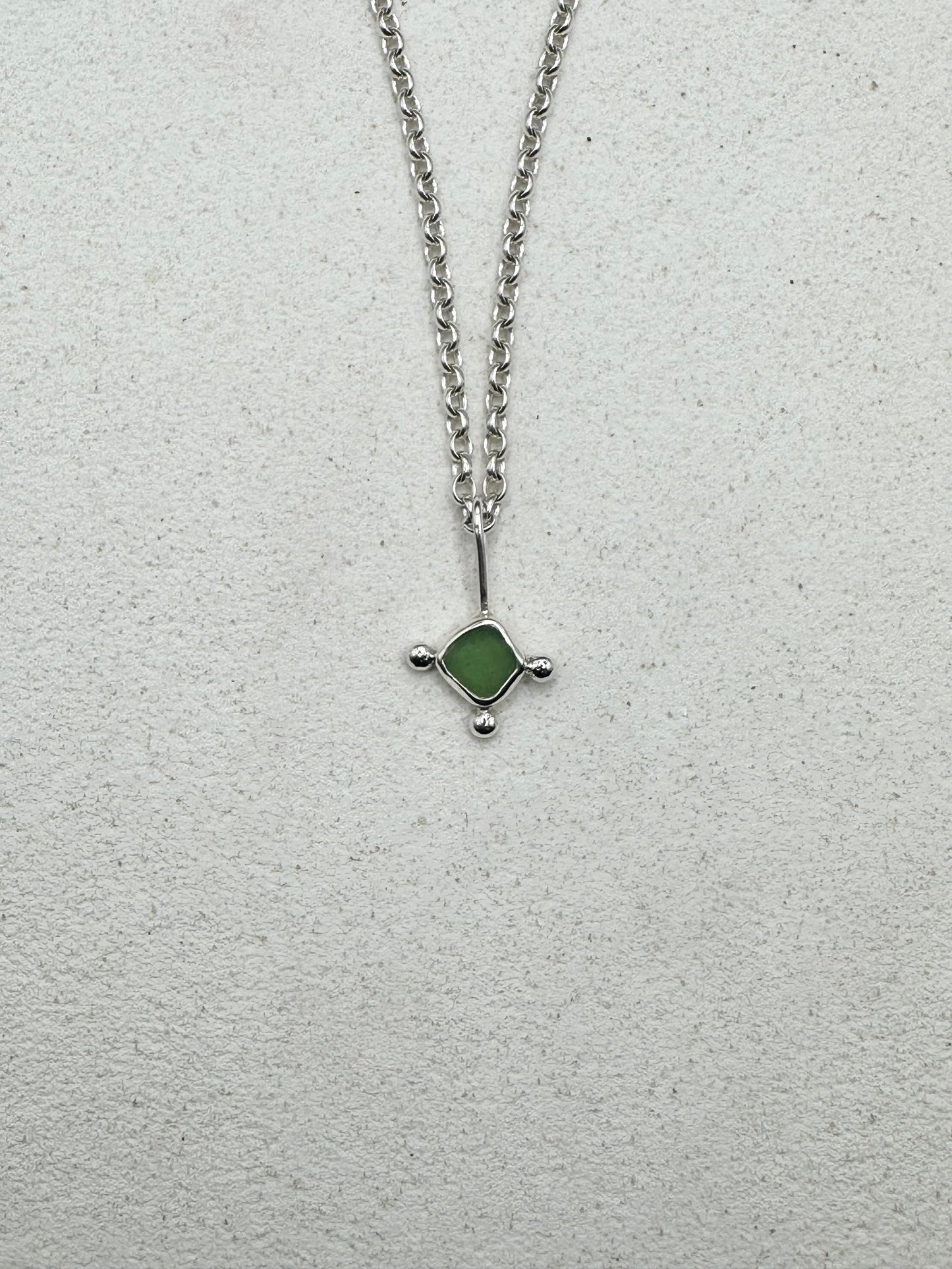Green Sunburst Pendant Silver